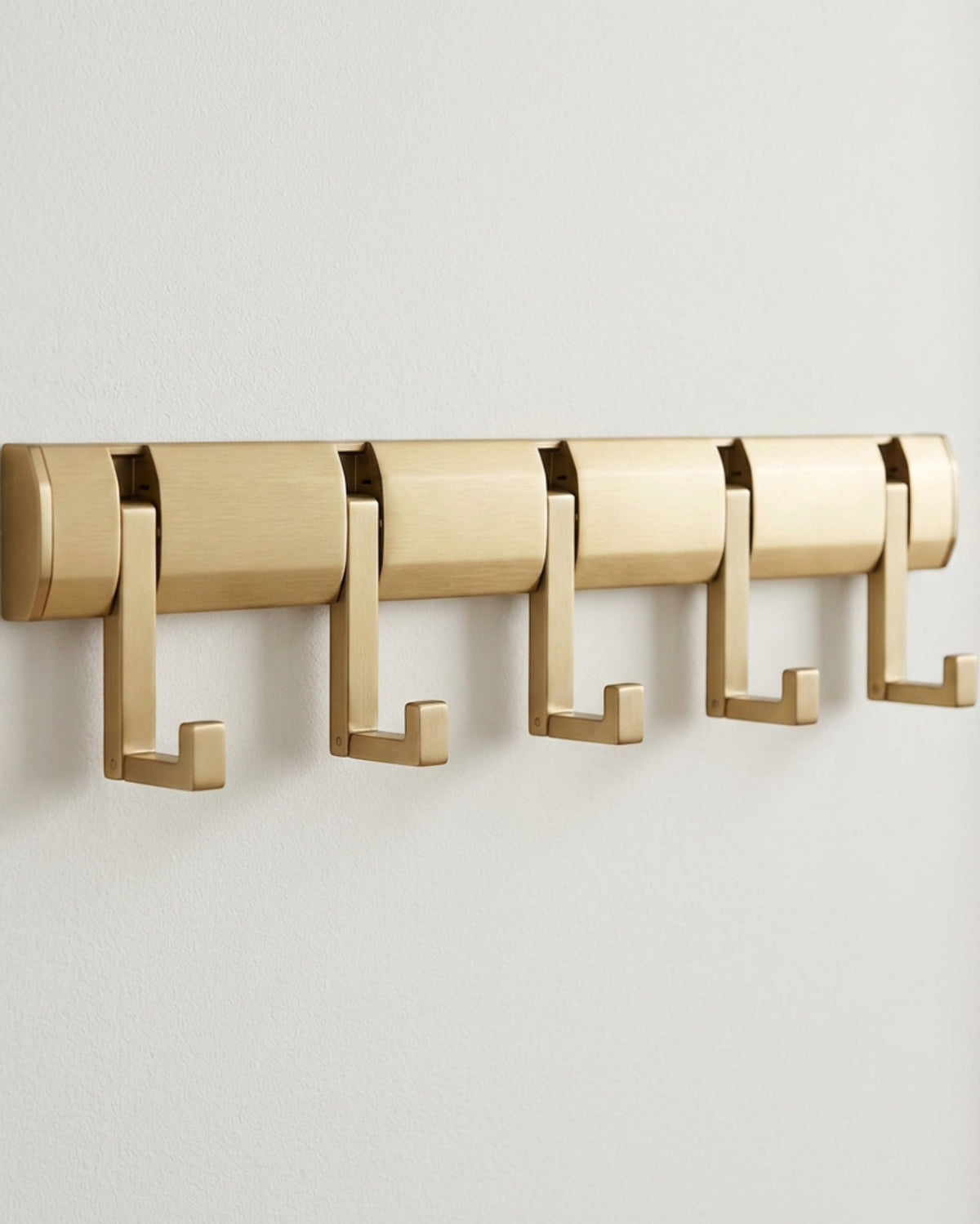 Aurt Five-Hook Folding Wall Rail 50 cm Brushed Brass Tone - Lifestyle view